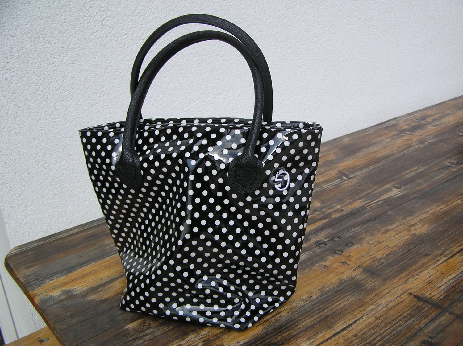 Sac trapèze bleu en toile cirée